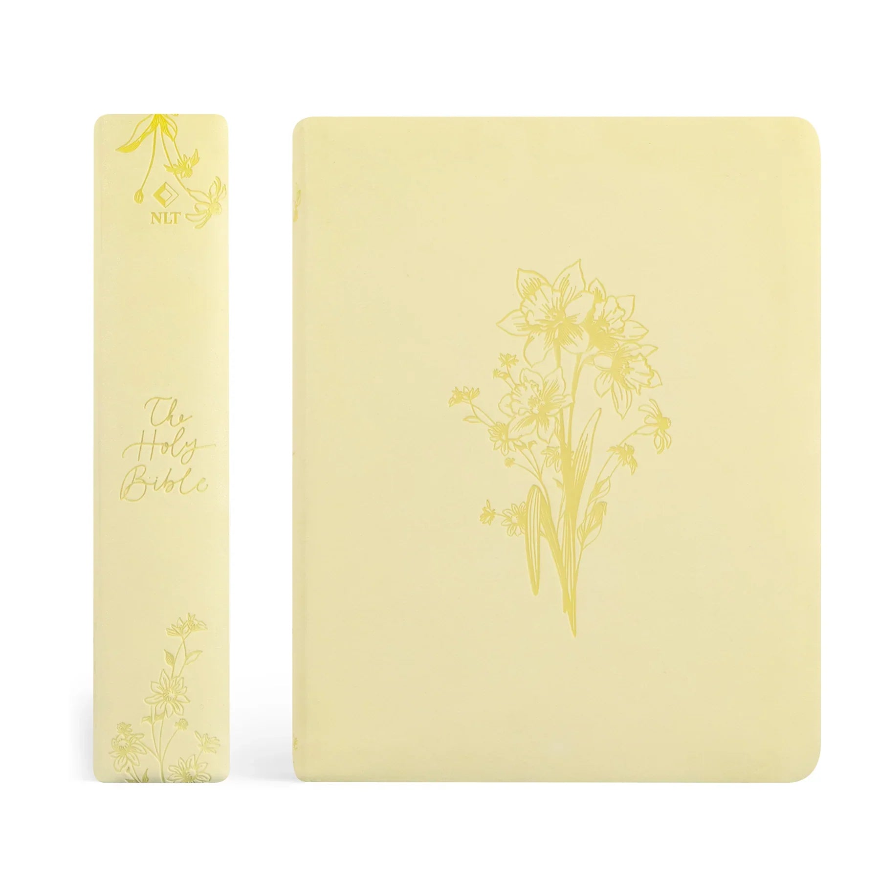 Two yellow Bibles with floral designs on a white background
